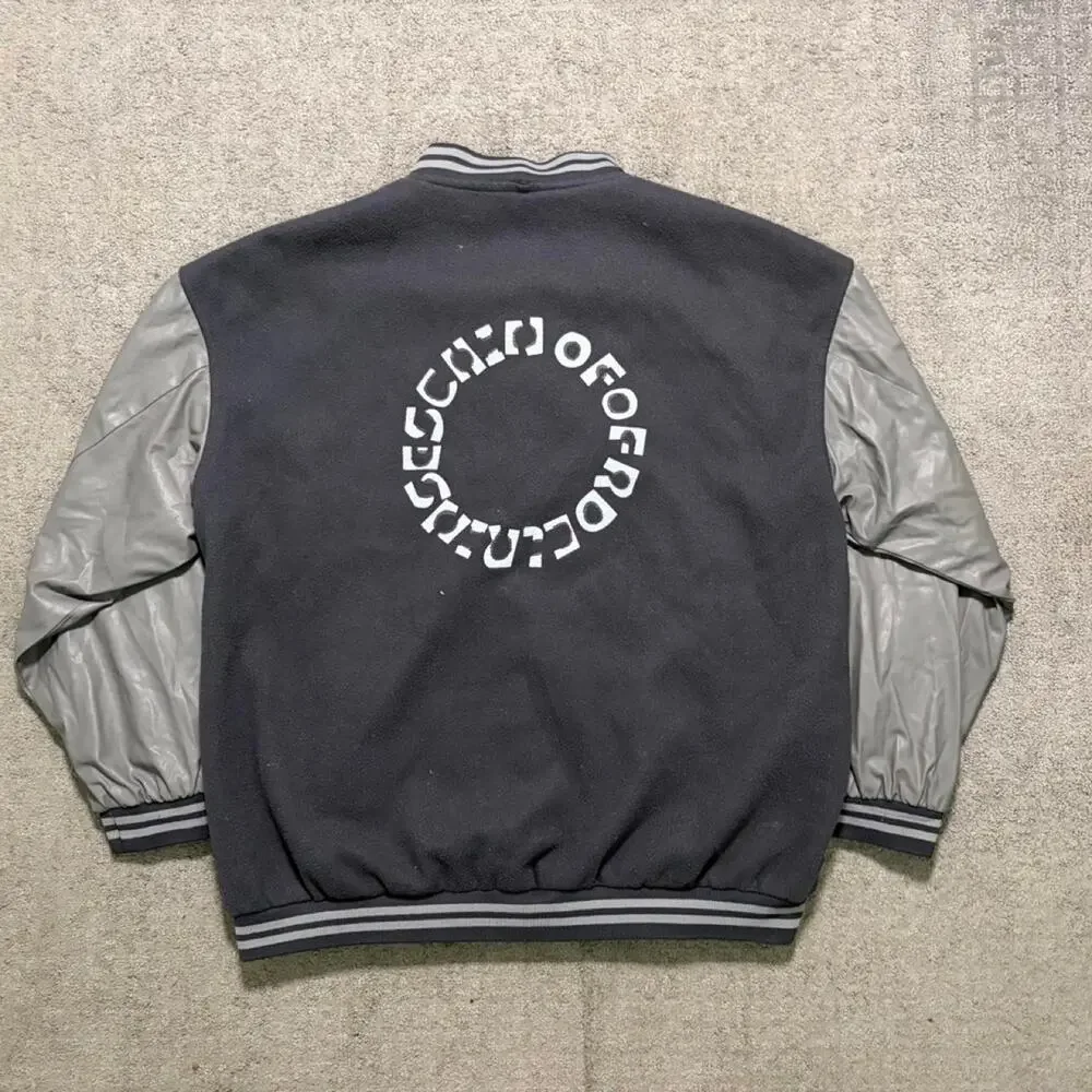 Black varsity jacket with white